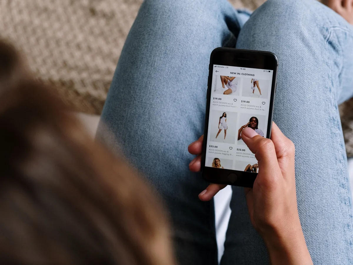 Customer shopping an online store on a phone