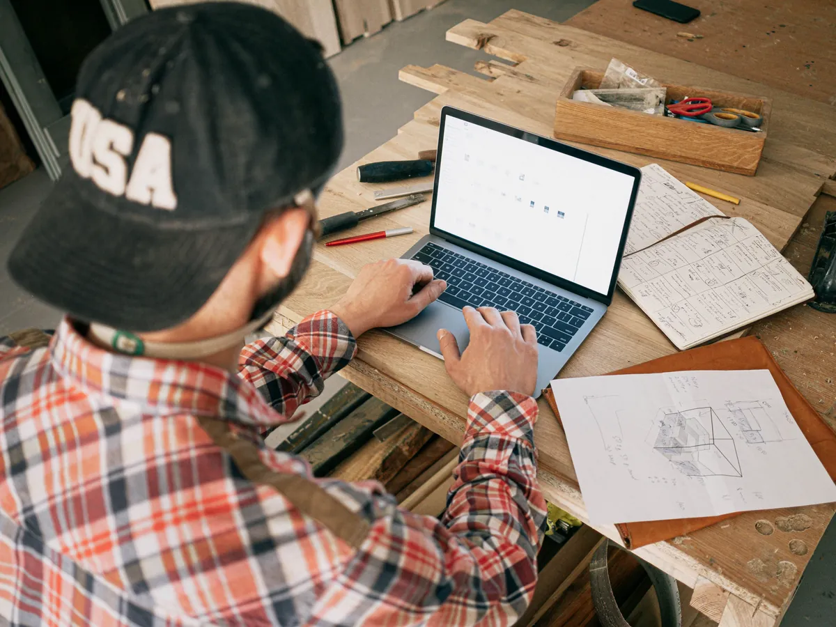 Small business owner working on his website